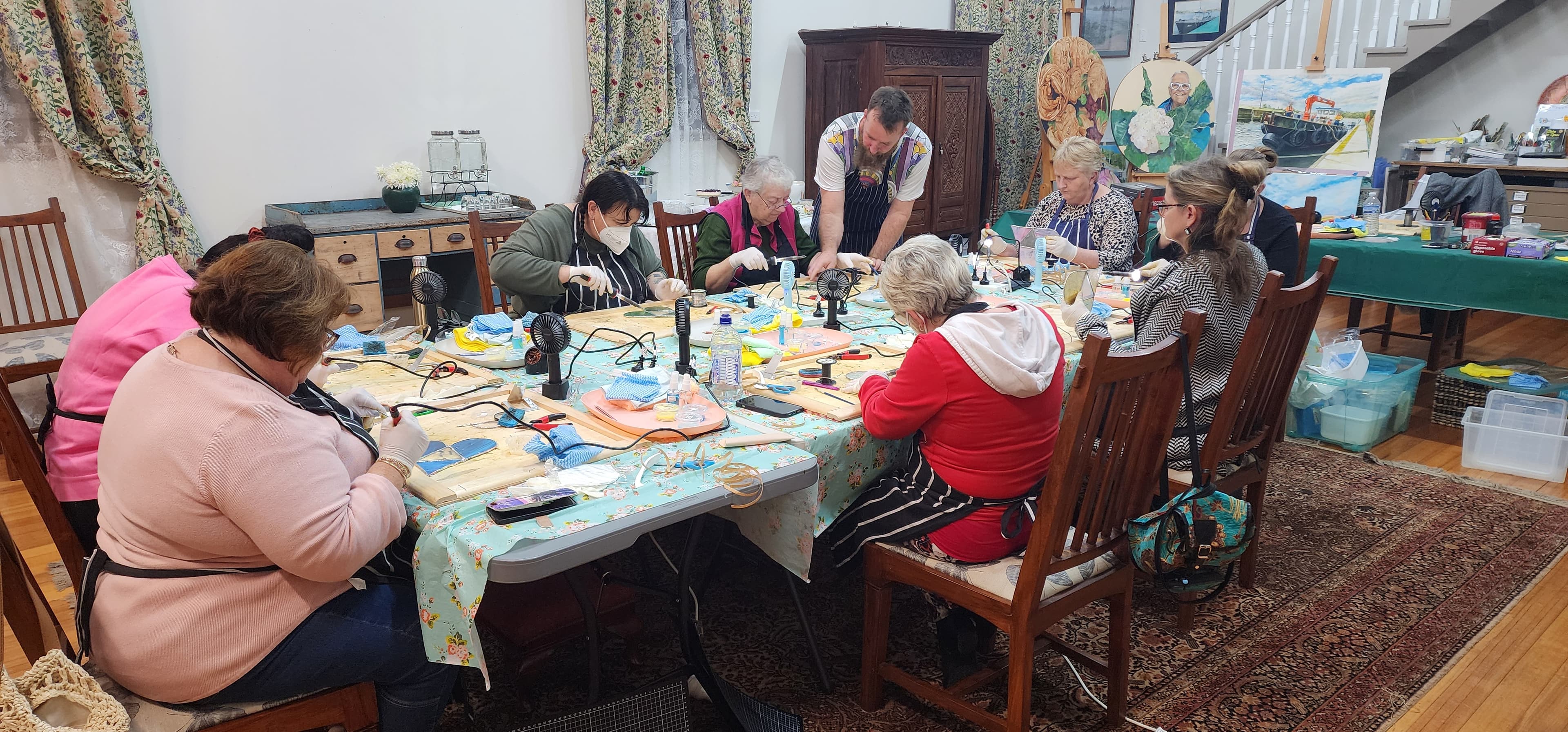 Paul and Sheree hosting a stained glass workshop
